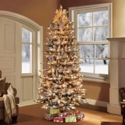 4.5ft. Pre-Lit Slim Flocked Fraser Fir Artificial Christmas Tree, Clear Lights 9 4.5ft. Pre-Lit Slim Flocked Fraser Fir Artificial Christmas Tree, Clear Lights -Michaels X-Mas Decor D248359S 2