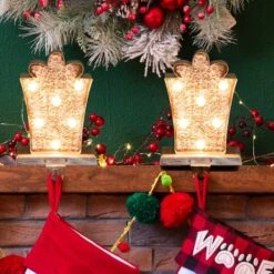 Glitzhome® 7.5" Pre-Lit Marquee Wooden Metal LED Gift Box Stocking Holder, 2ct. -Michaels X-Mas Decor D254143S 2