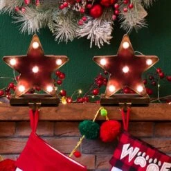 Glitzhome® 7.5" Marquee LED Star Stocking Holder, 2ct. 12 Glitzhome® 7.5" Marquee LED Star Stocking Holder, 2ct. -Michaels X-Mas Decor D254144S 2