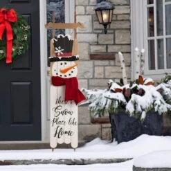 Glitzhome® 3.5ft. Wooden Christmas Snowman Porch Sign 13 Glitzhome® 3.5ft. Wooden Christmas Snowman Porch Sign -Michaels X-Mas Decor D254147S 2