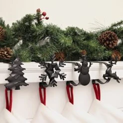 Original MantleClip® Matte Black Assorted Holiday Icons Stocking Holders, 4ct. 7 Original MantleClip® Matte Black Assorted Holiday Icons Stocking Holders, 4ct. -Michaels X-Mas Decor D349376S 2