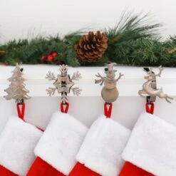Original MantleClip® Oil-Rubbed Bronze Assorted Holiday Icons Stocking Holders, 4ct. -Michaels X-Mas Decor D349378S 2
