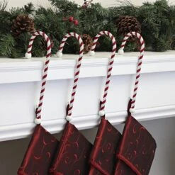 Haute Decor Classic Candy Cane Stocking Holders, 4ct. 7 Haute Decor Classic Candy Cane Stocking Holders, 4ct. -Michaels X-Mas Decor D349423S 2