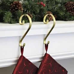 Haute Decor Stocking Scroll® Gold Foil Stocking Holders, 2ct. 7 Haute Decor Stocking Scroll® Gold Foil Stocking Holders, 2ct. -Michaels X-Mas Decor D349638S 2