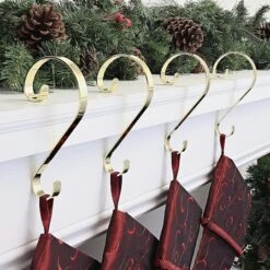 Haute Decor Stocking Scroll® Brass Stocking Holders, 4ct. -Michaels X-Mas Decor D349640S 2