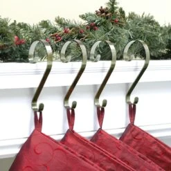 Haute Decor Stocking Scroll® Antique Brass Stocking Holders, 4ct. 7 Haute Decor Stocking Scroll® Antique Brass Stocking Holders, 4ct. -Michaels X-Mas Decor D349643S 2
