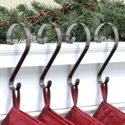 Haute Decor Stocking Scroll® Brushed Nickel Stocking Holders, 4ct. 8 Haute Decor Stocking Scroll® Brushed Nickel Stocking Holders, 4ct. -Michaels X-Mas Decor D349645S 2