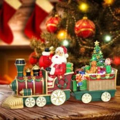 24" Pre-Lit Multicolor LED Santa Train Tabletop Décor 7 24" Pre-Lit Multicolor LED Santa Train Tabletop Décor -Michaels X-Mas Decor D393373S 2