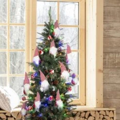 Glitzhome® 6ft. Red & White Fabric Christmas Gnome Garland, 2ct. 14 Glitzhome® 6ft. Red & White Fabric Christmas Gnome Garland, 2ct. -Michaels X-Mas Decor D445245S 3