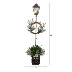 5ft. Pre-lit LED Holiday Decorated Lamp Post With Greenery In Decorative Planter 9 5ft. Pre-lit LED Holiday Decorated Lamp Post With Greenery In Decorative Planter -Michaels X-Mas Decor D478688S 2