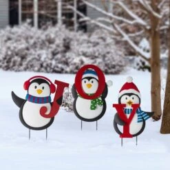 Glitzhome® 3.5ft. Metal Joy Penguin Yard Stake Set -Michaels X-Mas Decor D479454S 2