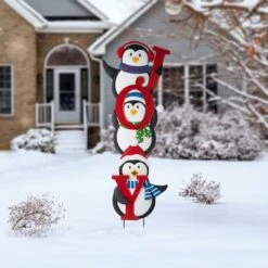 Glitzhome® 3.5ft. Metal Joy Penguin Yard Stake Set -Michaels X-Mas Decor D479454S 3