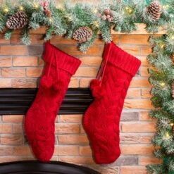 Glitzhome® 24" Red Knitted Polyester Christmas Stocking With Pom Pom, 2ct. 12 Glitzhome® 24" Red Knitted Polyester Christmas Stocking With Pom Pom, 2ct. -Michaels X-Mas Decor D479603S 2