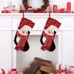 Glitzhome® 19" 3D Penguin Hooked Stockings, 2ct. 8 Glitzhome® 19" 3D Penguin Hooked Stockings, 2ct. -Michaels X-Mas Decor D479608S 2