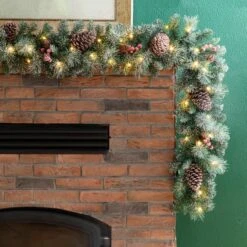 Glitzhome® 9ft. Pre-Lit Glittery Pinecone Christmas Garland With Timer, 2ct. 13 Glitzhome® 9ft. Pre-Lit Glittery Pinecone Christmas Garland With Timer, 2ct. -Michaels X-Mas Decor D493618S 4