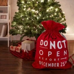 DII® Do Not Open Santa Drawstring Gift Bag 13 DII® Do Not Open Santa Drawstring Gift Bag -Michaels X-Mas Decor D539849S 5