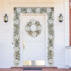 Glitzhome® 24" Pre-Lit Snow Flocked Greenery Pine Poinsettia Christmas Wreath -Michaels X-Mas Decor D652255S 3