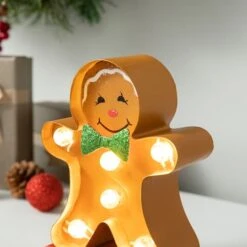 Glitzhome® 7.25'' Marquee LED Gingerbread Man Christmas Stocking Holder 16 Glitzhome® 7.25'' Marquee LED Gingerbread Man Christmas Stocking Holder -Michaels X-Mas Decor D652343S 5