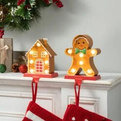 Glitzhome® Marquee LED Gingerbread House & Gingerbread Man Christmas Stocking Holder Set -Michaels X-Mas Decor D652344S 2