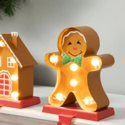 Glitzhome® Marquee LED Gingerbread House & Gingerbread Man Christmas Stocking Holder Set -Michaels X-Mas Decor D652344S 5