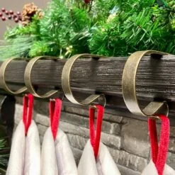Original MantleClip® Weathered Antique Brass Stocking Holders, 4ct. 7 Original MantleClip® Weathered Antique Brass Stocking Holders, 4ct. -Michaels X-Mas Decor D665822S 2