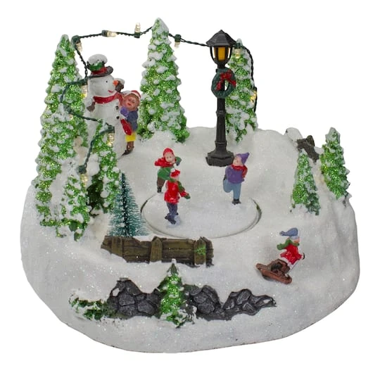 Northlight 9" Lighted Christmas Scene With Moving Skaters & Snowman 6 Northlight 9" Lighted Christmas Scene With Moving Skaters & Snowman - Image 4